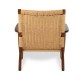 Replica of the Nordic Lounge CH25 armchair in walnut wood