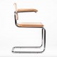 Replica of the Cesca Chair with armrests by designer Marcel Breuer