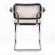 Replica of the Cesca Chair with armrests by designer Marcel Breuer