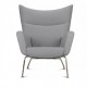 Wing chair replica by designer Hans J. Wegner